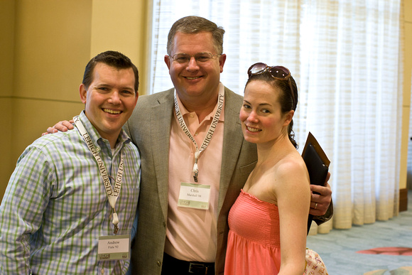 Andrew Fiala '92 (left) with Chris Marshall '88 and Colleen Marshall '99