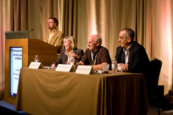 Paul Brown introduces China panelists Jill Brown '83, Stephen Goldmann '66, and Gene Vivino '80.