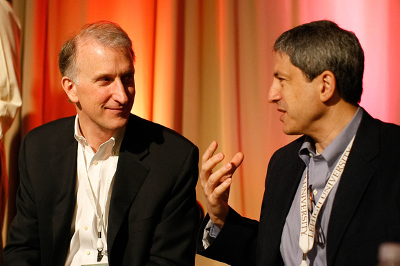 Philip Sheibley '81 (left) and Alan Snyder discuss remote monitoring for chronic conditions.