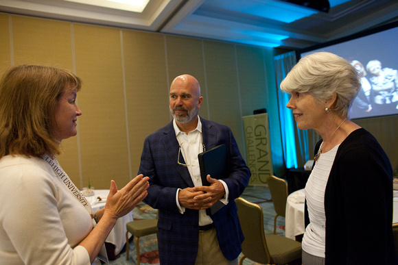 (Left to right) President Alice Gast chats with Michael Smerconish '84 and Joyce Goldmann.