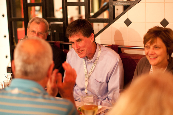 Provost Patrick Farrell and wife Val Johnson enjoy dinner with guests at a Friday Dine-Around.